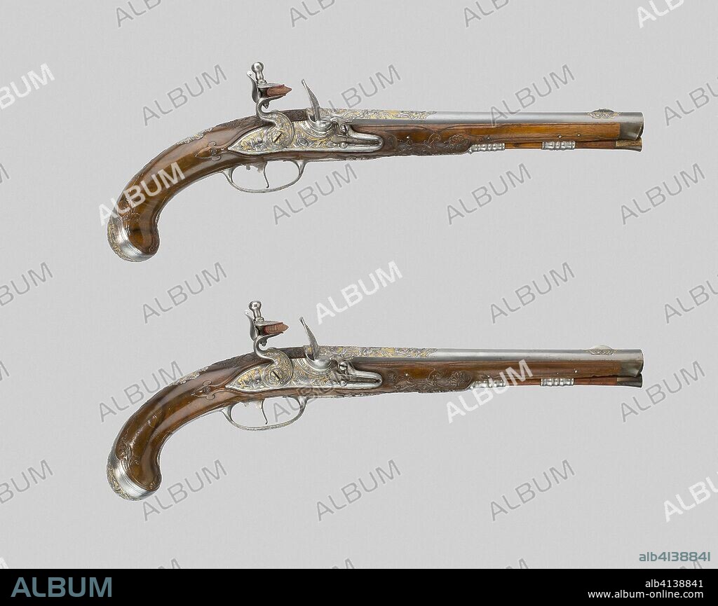 Pair of Flintlock Pistols. Flemish, possibly French. Date: 1690-1710. Dimensions: L. 42 cm (16 1/2 in.)
Barrel L. 26.7 cm (10 1/2 in.)
Caliber .51
Wt. 2 lb. 1 oz. each. Walnut, steel, and iron (?). Origin: Flanders.