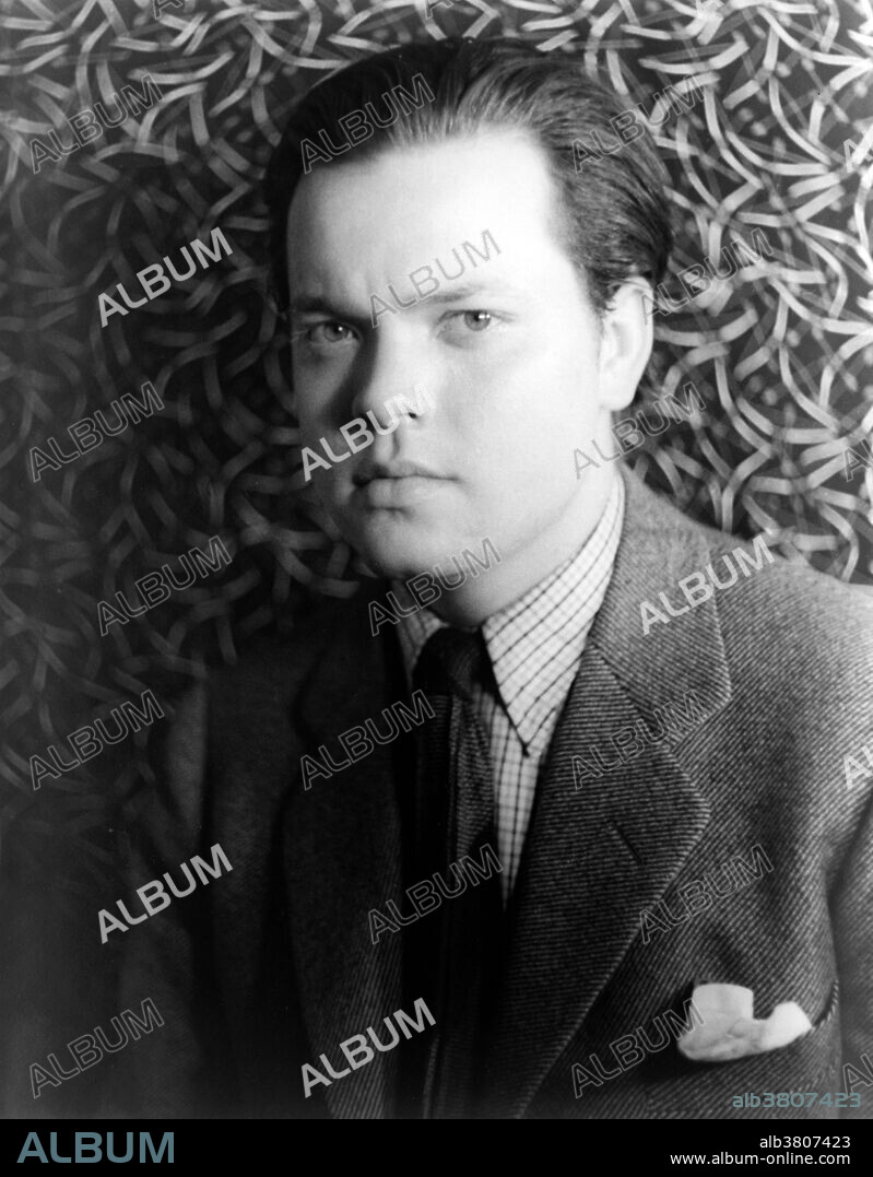 Welles photographed by Carl Van Vechten, March 1, 1937. George Orson Welles (May 6, 1915 - October 10, 1985) was an American actor, director, writer and producer who worked in theater, radio and film. He is best remembered for his innovative work in all three media: in theatre, most notably Caesar (1937), a groundbreaking Broadway adaptation of Julius Caesar; in radio, the debut of the Mercury Theatre, whose The War of the Worlds (1938), is one of the most famous broadcasts in the history of radio; and in film, Citizen Kane (1941), consistently ranked as one of the all-time greatest films. He was an outsider to the studio system and directed only 13 films in his career. Because of this, he struggled for creative control from the major film studios, and his films were either heavily edited or remained unreleased. His distinctive directorial style featured layered and nonlinear narrative forms, innovative uses of lighting such as chiaroscuro, unusual camera angles, sound techniques borrowed from radio, deep focus shots, and long takes. Well known for his baritone voice, Welles was a well-regarded actor in radio and film, a celebrated Shakespearean stage actor, and an accomplished magician noted for presenting troop variety shows in the war years. He died of a heart attack in 1985 at the age of 70.