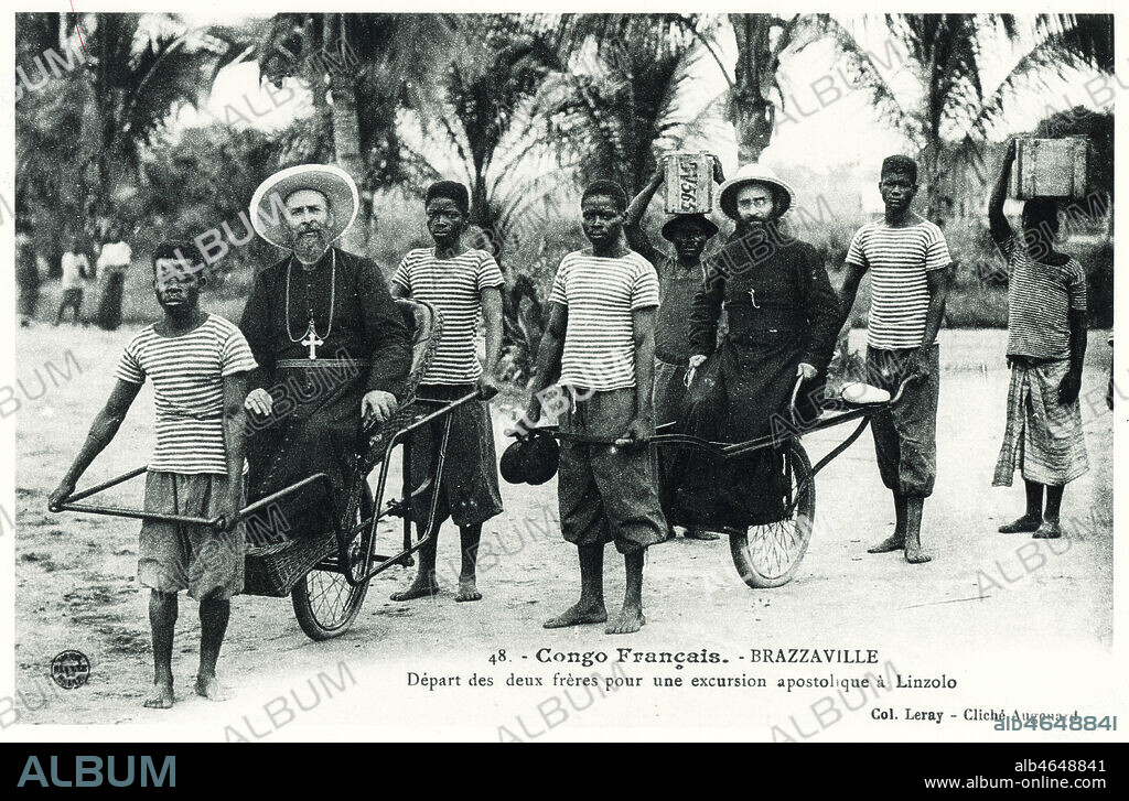 'Congo francais. Brazzaville. Depart des deux freres pour une excursion apostolique a Linzolo.' Deux religieux missionnaires dans des voitures a bras portes par des africains. Carte postale photographique vers 1910. Cliche AUgouard. Credit: Coll. Kharbine Tapabor.