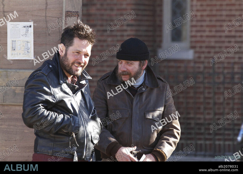 PAUL GIAMATTI and PAUL RUDD in ALMOST CHRISTMAS, 2013, directed by PHIL MORRISON. Copyright GREENESTREET FILMS.