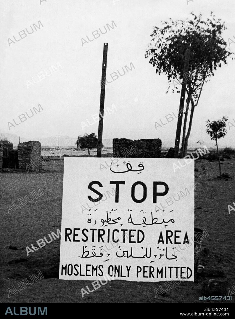 Saudi Arabia. the mecca. signpost indicating the beginning of restricted area moslems only permitted. 1953.