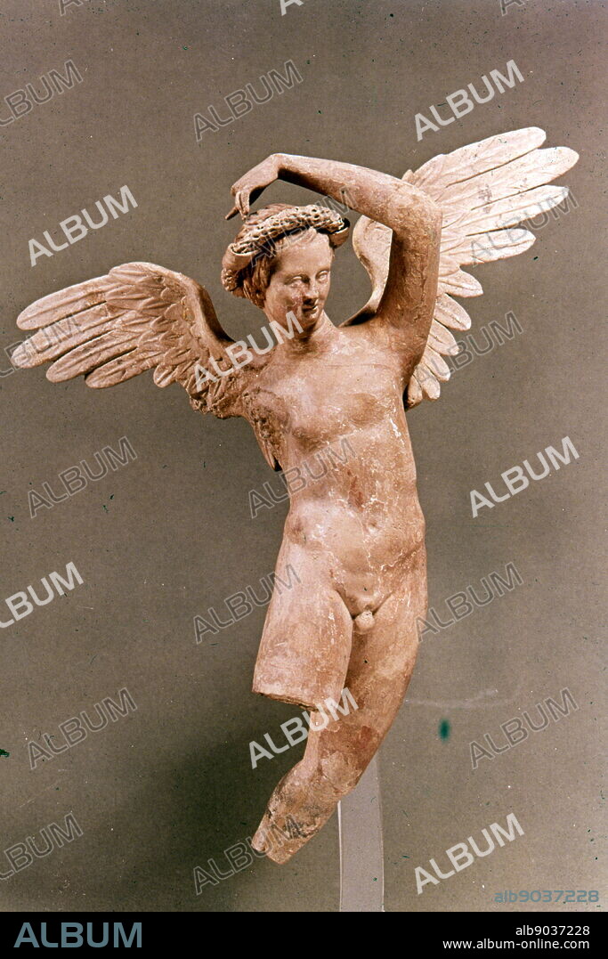 Statuette of nude Eros flying. The arms probably held a wreath or ribbon overhead. A woven wreath rests on the head. Greek, East Greek, Hellenistic Period, late 2nd century B.C. Myrina, Aeolis, Asia Minor.