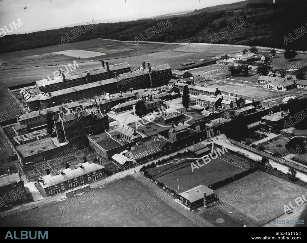 Escaped Convist Stil At Large.An Aerial view of Parkhurst. Prison, Isle of Wight, out of which, George Jackson Escaped nine days ago.Paratroopers and police continued the search for the escaped convict George Jackson, today June 26. Jackson, who was serving a five year sentence, for Housebreaking, broke out of Parkhurst Prison, Nine Days ago. Since then he has entered a number of houses, stealing food and clothing. During his nine days of liberty he has narrowly escaped being recaptured many times. July 9, 1946. (Photo by Associated Press Photo).