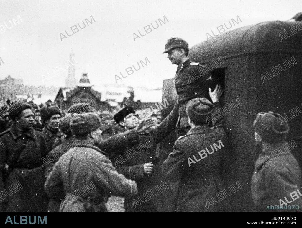 World war 2, december 19, 1943, still from a film on the kharkov trial produced by artkino, hans ritz emerging from the truck to be executed.