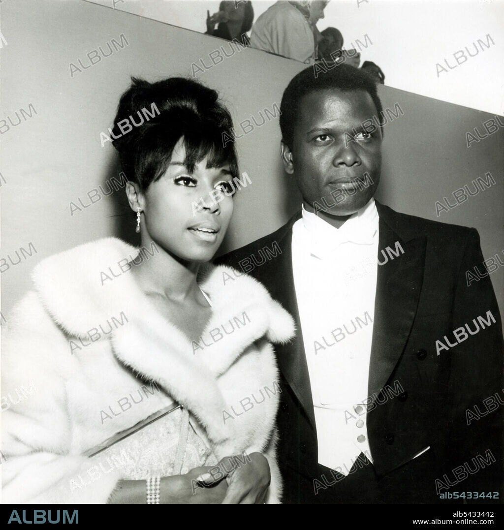 DIAHANN CARROLL and SIDNEY POITIER. DIANE CARROLL AND SIDNEY POITIER AT THE 36TH ANNUAL ACADEMY AWARDS.(Credit Image: Â© Globe Photos/ZUMA Wire).