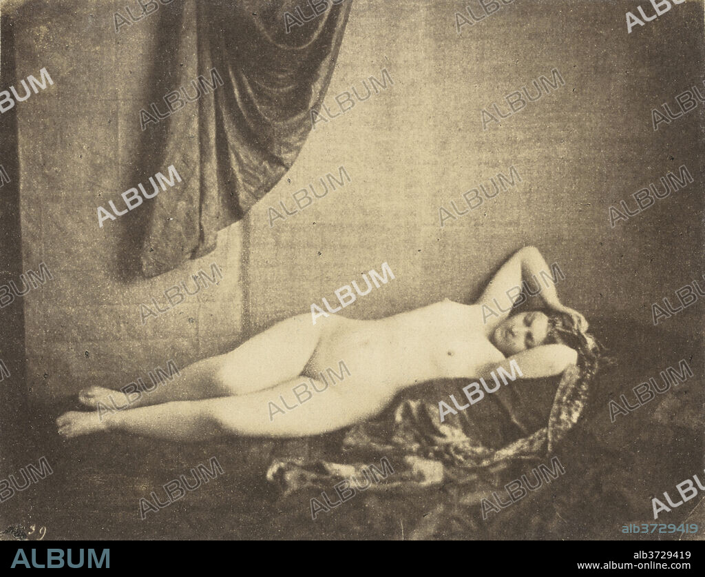 JULIEN VALLOU DE VILLENEUVE. Étude d'après Nature [nude study]. Dated: 1854. Dimensions: image: 12.4 × 16.2 cm (4 7/8 × 6 3/8 in.)  support: 24.5 × 32.1 cm (9 5/8 × 12 5/8 in.). Medium: salted paper print from waxed paper negative mounted on blue paper.