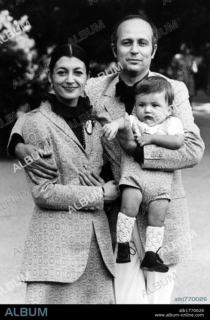 Carla Fracci with her husband Beppe Menegatti and son Francis. The Italian ballerina Carla Fracci posing with her husband Beppe Menegatti and her son Francesco in Milan. 1970s.