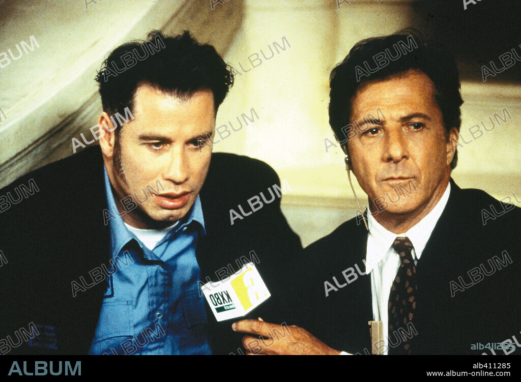 DUSTIN HOFFMAN and JOHN TRAVOLTA in MAD CITY, 1997, directed by CONSTANTIN COSTA-GAVRAS. Copyright WARNER BROTHERS.