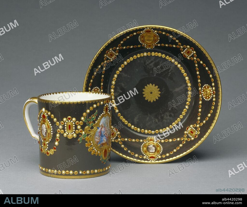 Cup and Saucer, Ground color painted by Antoine Capelle (French, active 1745 - 1800), Painted reserve and cameos attributed to Pierre-André Le Guay (French, active 1772 - 1818), Gilded by Etienne-Henri Le Guay (French, 1719/1720 - about 1799), jeweling by Philippe Parpette (French, active 1755 - 1757, 1773 - 1806), Sèvres Manufactory (French, 1756 - present), Sèvres, France, 1781, Soft-paste porcelain, brown ground color (? merde d'oie), polychrome enamel decoration, enamels in imitation of jewels, gilding and gold foils, 7 × 9.4 cm (2 3/4 × 3 11/16 in.).