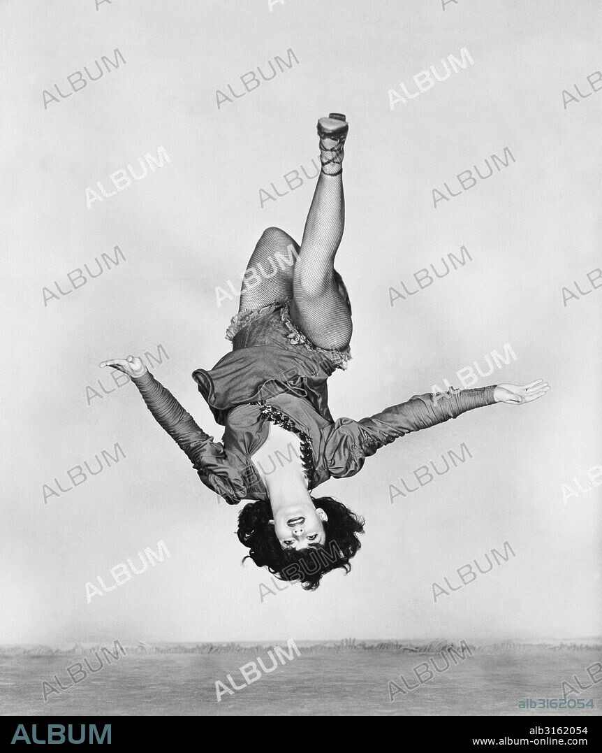 Hollywood, California:  1943. Acrobatic 'specialty' dancer Miriam LaVelle performs a back flip as part of her dance routine.