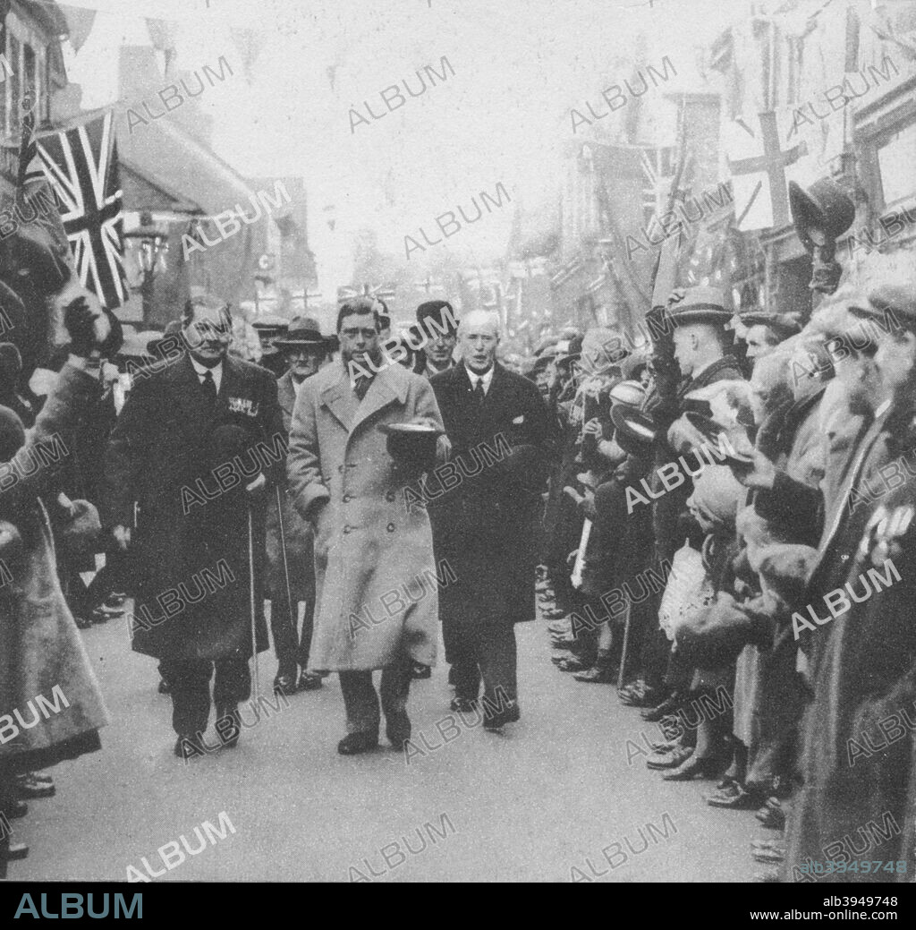 The Prince of Wales greeted by the people of Porth, Glamorgan, during his visit to Wales, 1932 (1936). From Edward The Eighth - Our King, by A.V. Groom. [Allied Newspapers Limited, London, 1936].