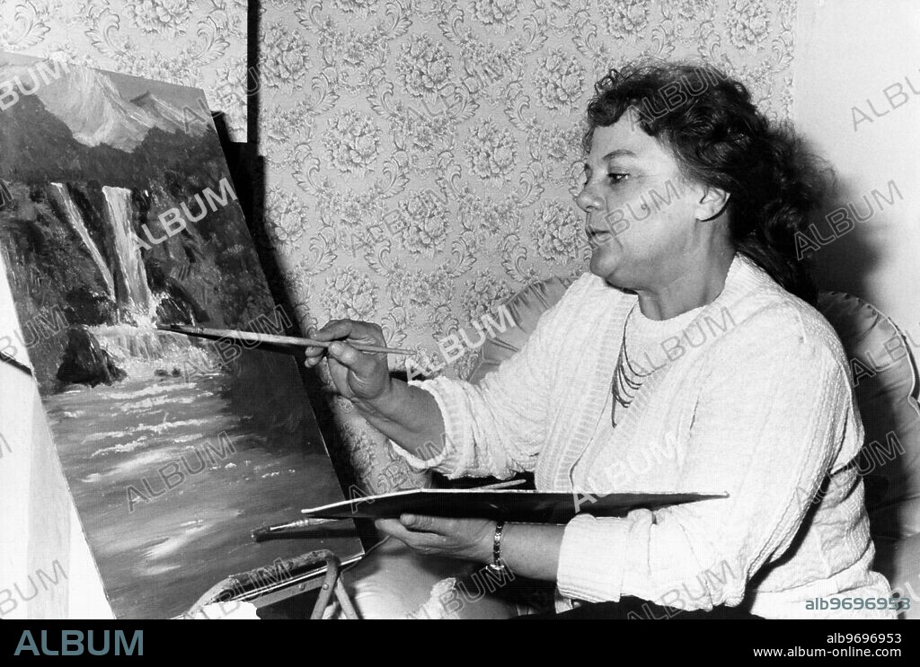 Psychic Nella Jones takes time off to paint.