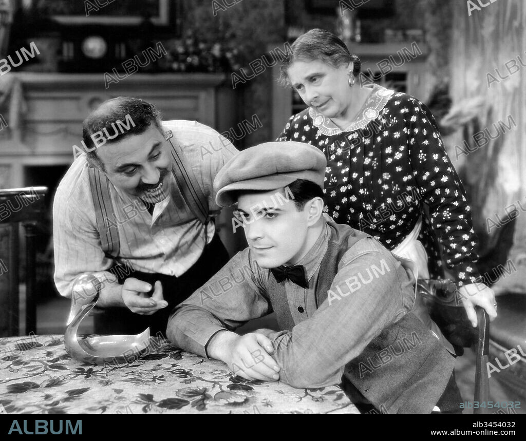FERIKE BOROS, HENRY ARMETTA and RAMON NOVARRO in HUDDLE, 1932, directed by SAM WOOD. Copyright Metro-Goldwyn-Mayer (MGM).