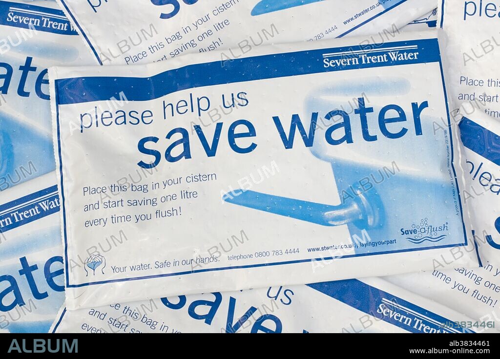 Placing water hippo save-a-flush bags, provided free by Severn Trent Water, UK, in a toilet cistern helps conserve water, saving one liter each time the toilet is flushed.
