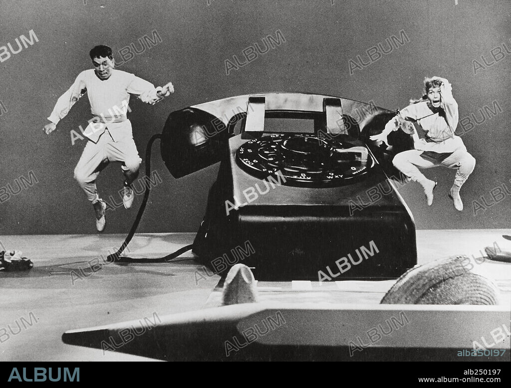 CANTINFLAS and DEBBIE REYNOLDS in PEPE, 1960, directed by GEORGE SIDNEY. Copyright COLUMBIA PICTURES.