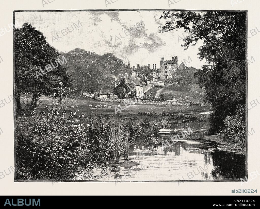 HADDON HALL, FROM THE WYE. An English country house on the River Wye at Bakewell, Derbyshire, one of the seats of the Duke of Rutland, occupied by Lord Edward Manners (brother of the current Duke) and his family. UK.