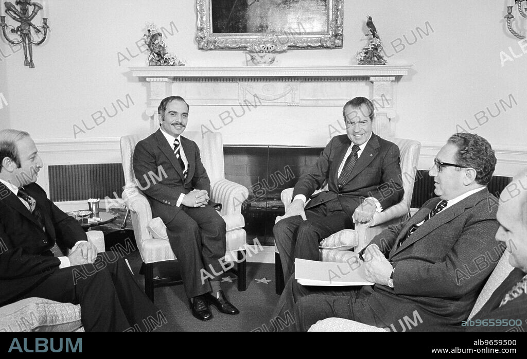 King Hussein of Jordan (center left) visiting with U.S. President Richard Nixon (center right) with U.S. Secretary of State Henry Kissinger next to Nixon, White House, Washington, D.C., USA, photograph by Marion S. Trikosko, March 12, 1974.