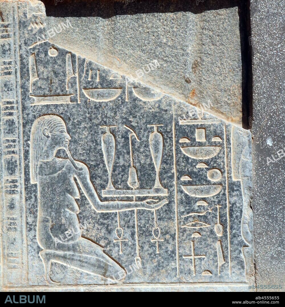 A photograph taken of the Red Chapel of Hatshepsut (the Chapelle Rouge) constructed initially as a barque shrine during the reign of Hatshepsut, the fifth pharaoh of the eighteenth dynasty of Ancient Egypt and ruled from approximately 1479 to 1458 BC. Although it had been demolished and parts were reused in antiquity, following rediscovery, the chapel has been reconstructed using its original materials. Its original location is thought to have been in the central court of the temple of Amun at Karnak, near Thebes.