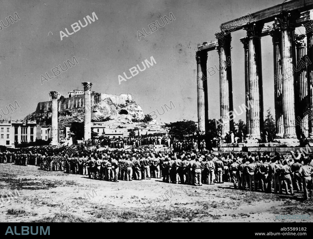 Greek Civil War 1944-1949:. Before the offensive by government troops against the Communist guerilla units under Markos: King Paul I stands in front of the Temple of Zeus on the Acropolis in Athens as a newly-formed batallion parades past. Photo, 20 June 1948.