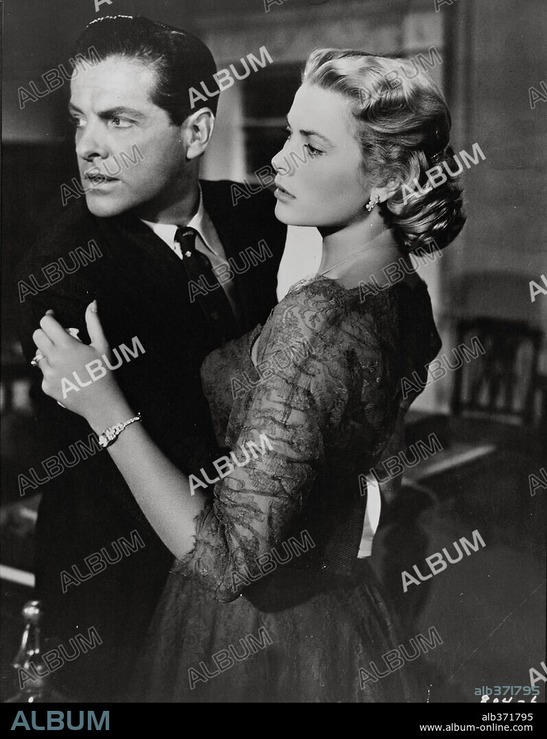 GRACE KELLY y ROBERT CUMMINGS en CRIMEN PERFECTO, 1954 (DIAL M FOR MURDER), dirigida por ALFRED HITCHCOCK. Copyright WARNER BROS.