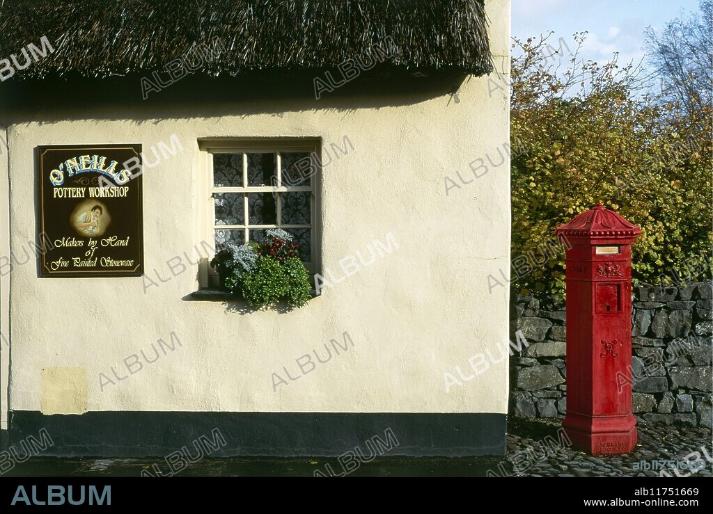 O'Neills pottery workshop, Bunratty Castle and Folk Park. Old red post box. *** Local Caption ***.