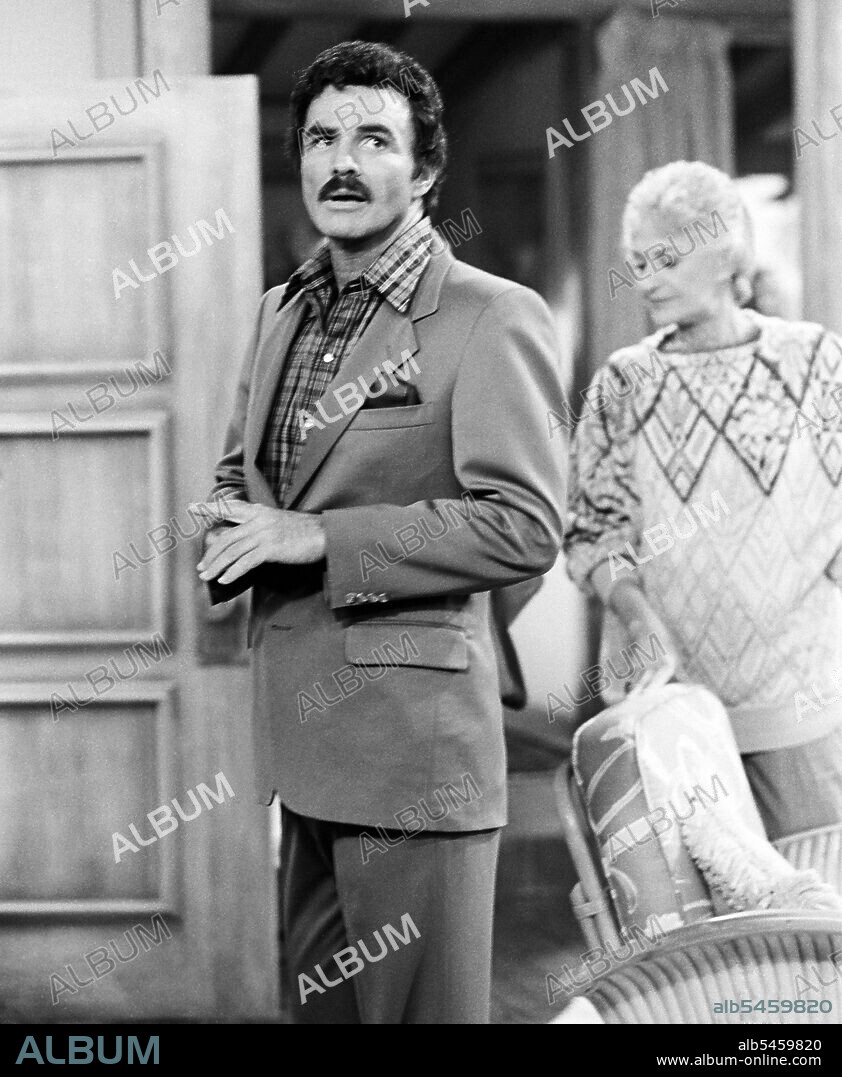 BEA ARTHUR and BURT REYNOLDS in THE GOLDEN GIRLS, 1985, directed by SUSAN HARRIS. Copyright TOUCHSTONE TELEVISION.