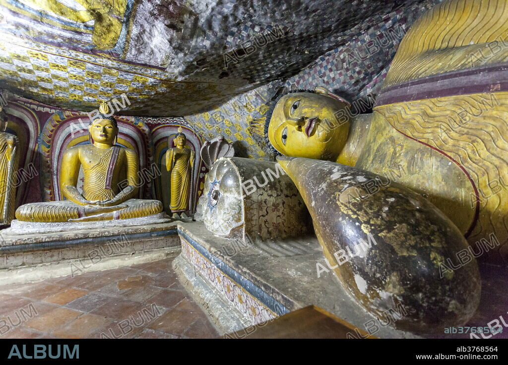 Sitting and reclining Buddha statues, Royal Rock Temple, Golden Temple of Dambulla, UNESCO World Heritage Site, Dambulla, Sri Lanka, Asia.