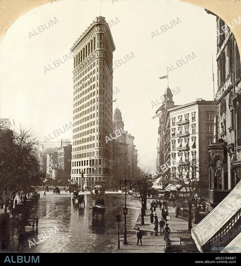 New York, New York:  1903. The Flatiron Building (originally named the Fuller Building) at Fifth Avenue and Broadway at the south end of Madison Square in New York City. It is 22 stories tall and was designed by Daniel Burnham.