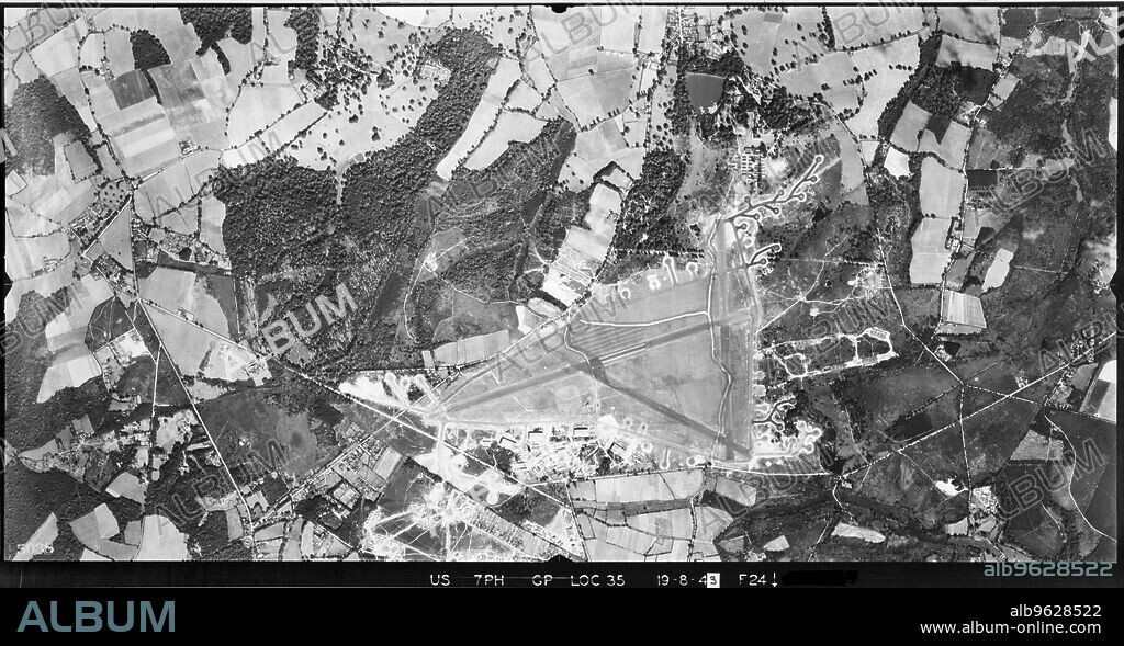 USAAF PHOTOGRAPHER. RAF Aldermaston, Berkshire, August 1943. Constructed by RAF Bomber Command in 1941, the airfield was transferred to USAAF service in 1942. It was then primarily used as a base for Douglas C-47 Skytrain troop transport aircraft.