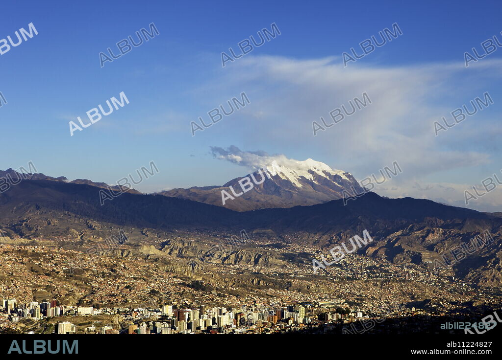 View over La Paz with Mount Illimani in the background, Bolivia, South America.