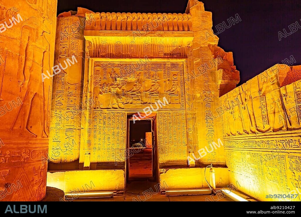 Relief and Hieroglyph on the wall in The Temple of Sobek and Horus in the night at Kom Ombo, Aswan Governorate, Upper Egypt.