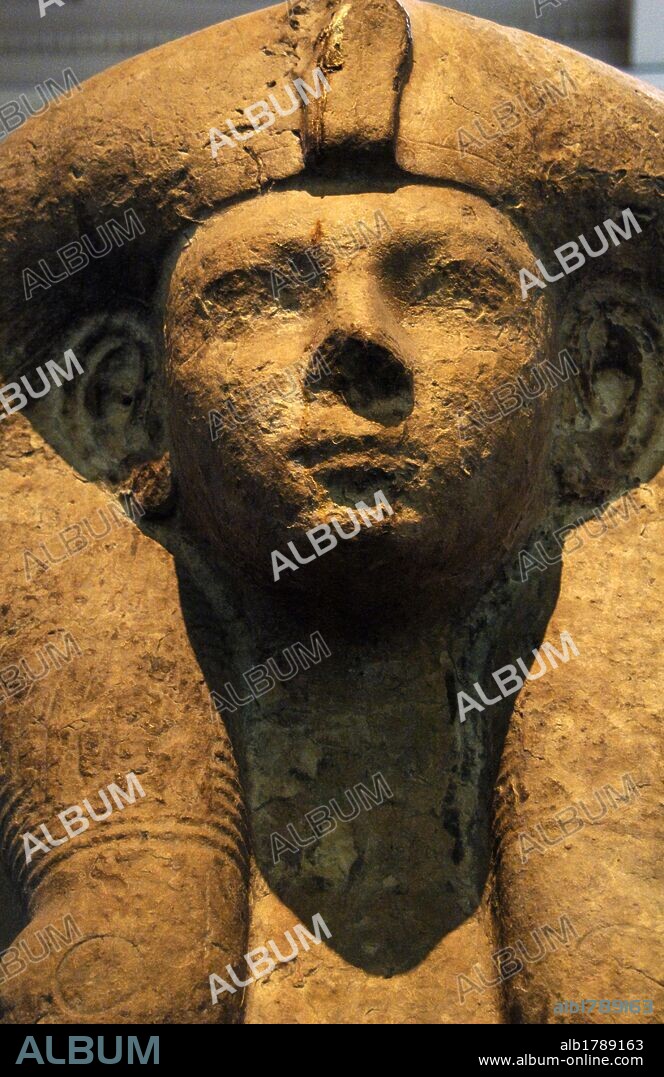 Ahmose-Merytamun. Egyptian queen and wife of Amenhotep I. Upper part of seated statue of Queen Ahmose-Merytamun wearing Hathor wig. 18th Dynasty, c. 1500 BC-1450 BC. From the Temple of Amun, Karnak (Thebes). Detail. Limestone. British Museum. London, England, United Kingdom.