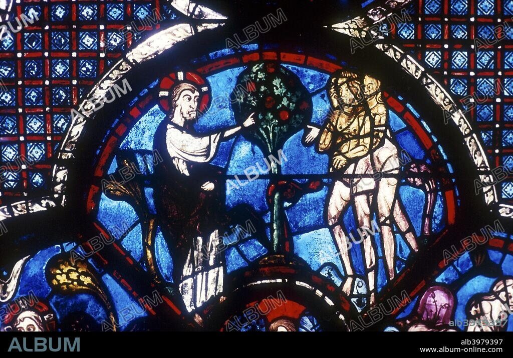 The Good Samaritan Window, Chartres Cathedral, France, 13th century. God warning Adam and Eve not to eat the fruit of the Tree of Knowledge.