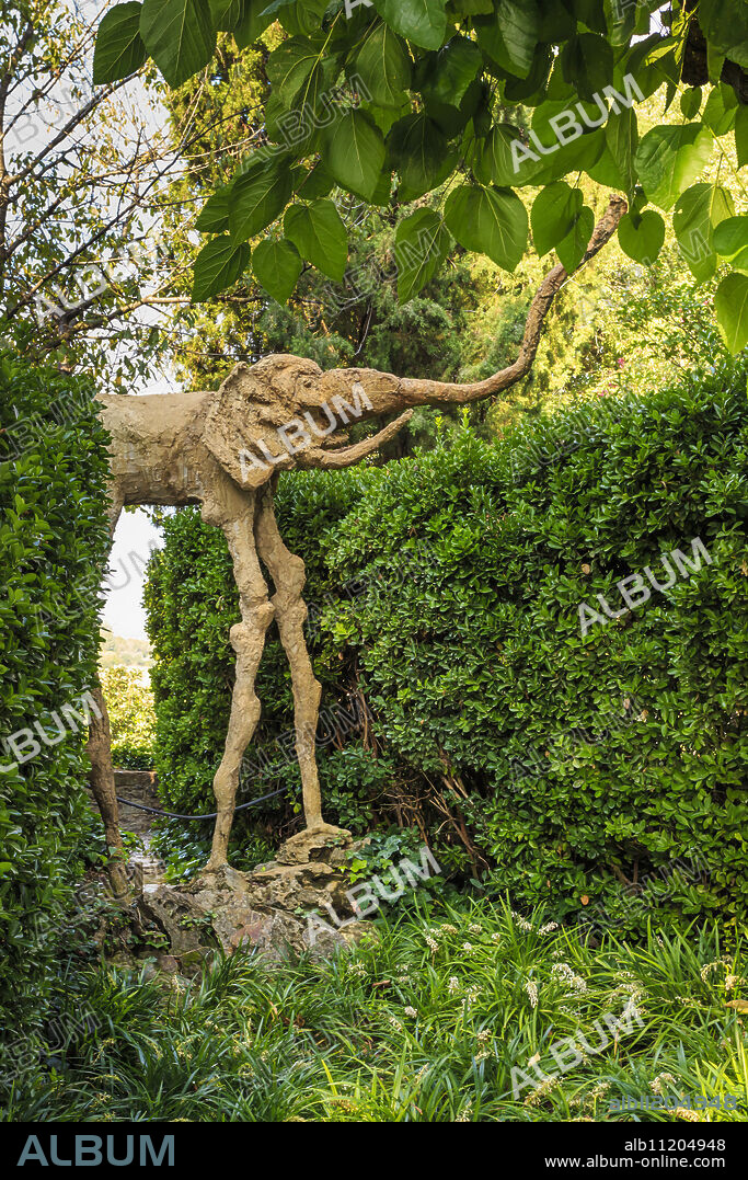SALVADOR DALÍ. Gala Dali Castle Museum, elephant statue in garden, medieval home museum of Salvador Dali, Pubol, Baix Emporda, Girona, Catalonia, Spain, Europe.