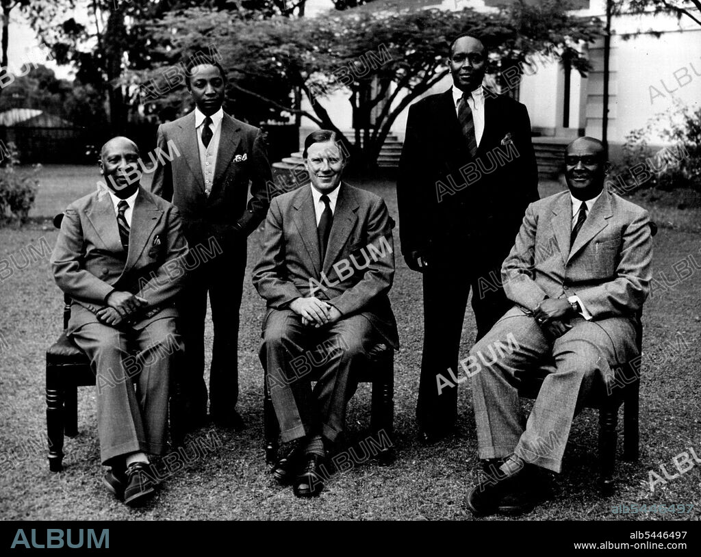 Colonial Personalities: The Governor And Native Rulers Of Uganda Colony -- The four African Kings of Uganda, Photographed together for the first time, with the governor of Uganda. His Excellency Sir Andrew Cohen, K.C.M.G., O.B.E. They are (left to right) - Tito Winyi II, of Bunyoro, who celebrated the Silver Jubilee of his Accession in April, 1949; Edward Mutesa II, of Buganda, educated at Cambridge, Honorary Captain of the Grenadier Guards, and ruler of the largest of Uganda's four Kingdoms; Edward Gasyonga II, of Ankole, whose country holds vast herds of cattle; and Geirge Rukidi III, of Toro. The Kingdom of Toro includes the Ruwensori Mountains, scene of the present scientific expedition led by professor W.Q. Kennedy, of leeds University, and the great £100,000,000 copper and cobalt mine at Kilembe. December 17, 1952. (Photo by Camera Press).