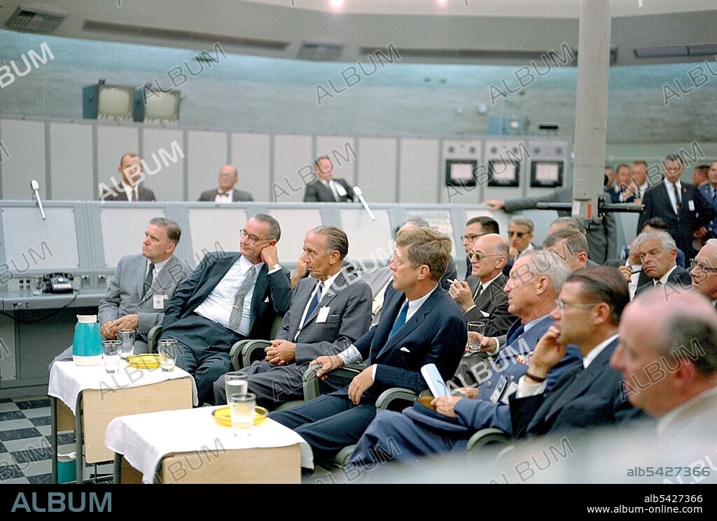 US president John F Kennedy at the Kennedy Space Center in Florida, USA, September 11, 1962. A briefing is given by Major Rocco Petrone to the president during a tour of Blockhouse 34 at the Cape Canaveral Missile Test Annex. Secretary of Defense Robert McNamara is second from right in the front row.