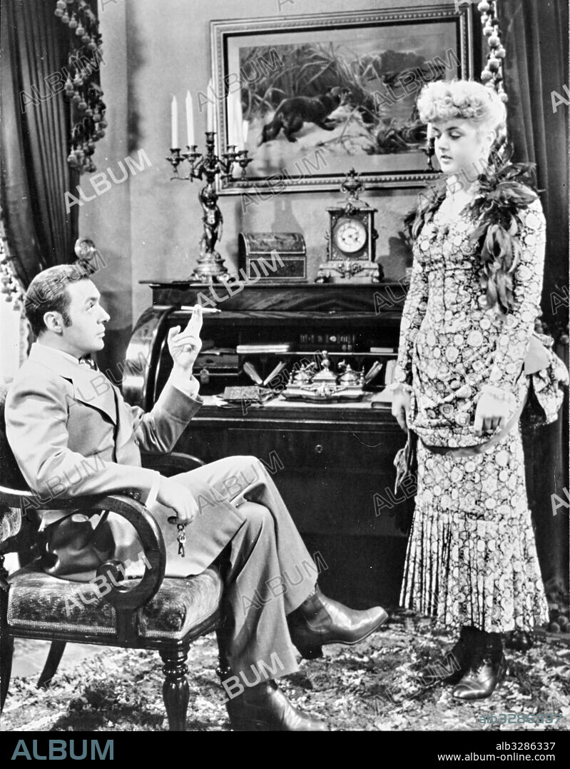 ANGELA LANSBURY and CHARLES BOYER in GASLIGHT, 1944, directed by GEORGE CUKOR. Copyright M.G.M.