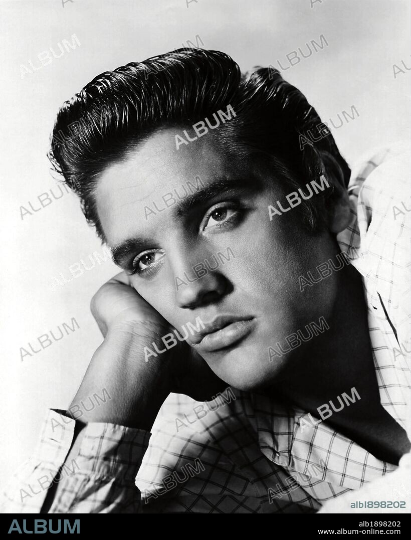 ELVIS PRESLEY en LOVE ME TENDER, 1956, dirigida por ROBERT D. WEBB. Copyright 20TH CENTURY FOX.