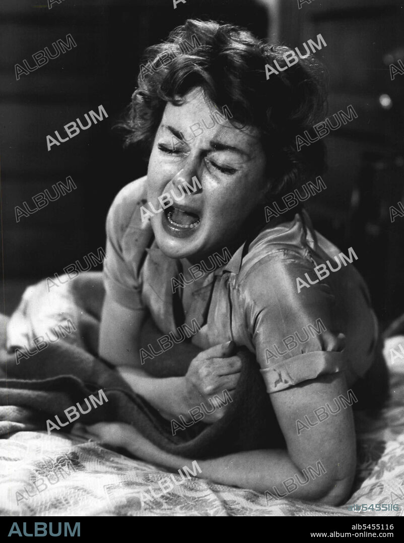 Despair ... Susan Hayward, portraying Lillian Roth, has reached the height of despair due to her unhappy life, in this scene from M-G-M's "I'll Cry Tomorrow", the devastingly frank, sometimes shocking, but nevertheless inspiring dramatization of the best-selling autobiography of Lillian Roth. Susan Hayward heads the starring cast that includes Richard Conte, Eddie Albert, Jo Van Fleet, Don Taylor and Ray Danton. Lawrence Weingarten produces and Daniel Mann directs. December 10, 1955.