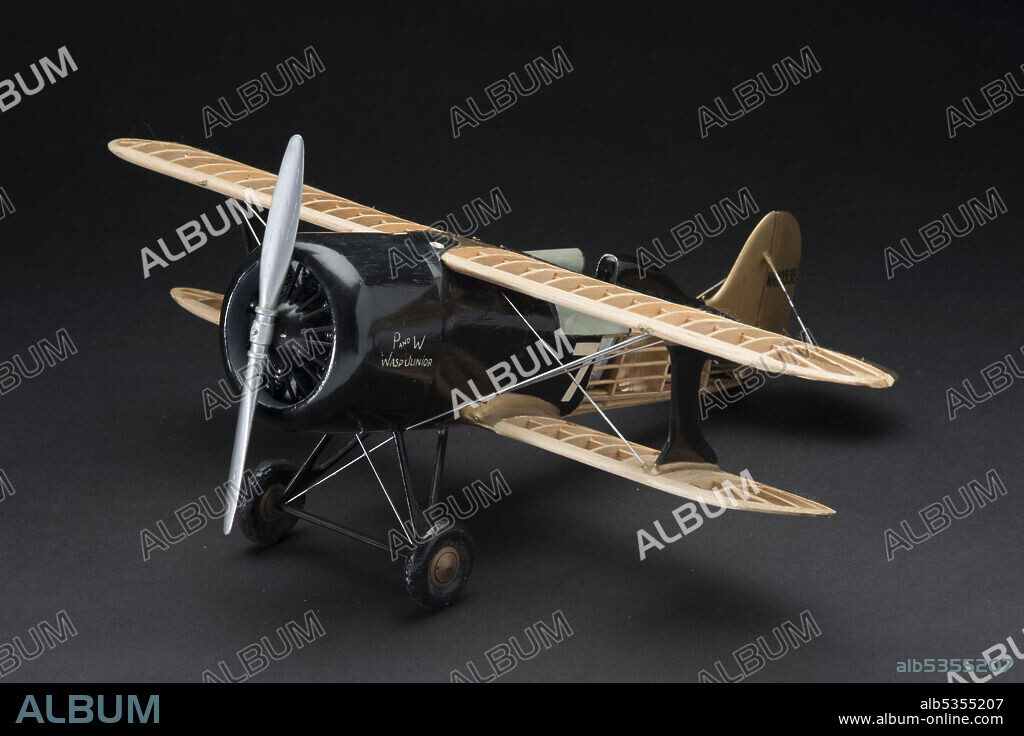 Model, Static, Laird LC-DW Solution, ca. 1939. Balsa and metal display model of the Laird LC-DW Solution racing aircraft which won the 1930 Thomson Trophy Race, in black and natural, uncovered structure paint scheme. 1/16 scale.