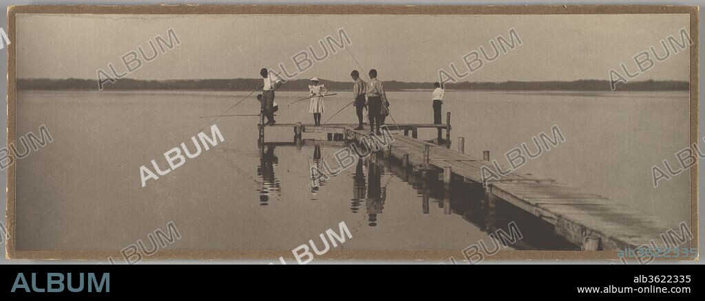[Children Fishing]. Artist: William James Mullins (American, 1860-1917). Dimensions: Image: 9.1 x 25.7cm (3 9/16 x 10 1/8in.)
Mount: 9.8 × 26.4 cm (3 7/8 in. × 10 3/8 in.). Date: ca. 1900.
William Mullins, of Franklin, Pennsylvania, was a minor member of the Photo-Secession. He was included in the Philadelphia Photographic Salon at the Pennsylvania Academy of Fine Arts in 1898, the first exhibition of photography in America held at a recognized fine arts institution. Juried by two painters and three photographers, including Alfred Stieglitz, the show was the first to exhibit photographs solely for their artistic merit, completely abandoning specific categories such as genre, landscape, or portraiture. Mullins's work appeared in the October 1901 issue of "Camera Notes," but his greatest public achievement was the display of twelve of his photographs in the International Exhibition of Pictorial Photography, at the Albright Art Gallery in Buffalo, New York, in 1910.
Water was nature's living mirror to members of the Photo-Secession, a reflective, ever-changing surface that served as a perfect test of an artist's pictorial skills. Elegant distortions caused by surface ripples appear in picture after picture from the period, but few photographs are as well constructed as this one of children fishing. By cropping his print to a narrow rectangular strip, Mullins emphasized the uninflected expanse of placid water. The low camera position relates the anglers to the distant shore--a line of trees as irregular as their bamboo poles--while their heads float above the horizon like bobbers on the lake's surface.