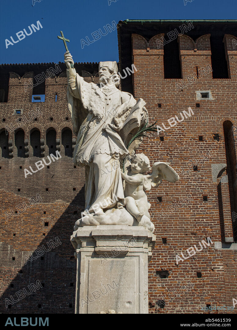 Milan, Lombardy, Italy, Europe. Sforza's Castle (Castello Sforzesco), was built in 15th Century by duke Francesco Sforza, is situated in the center of the city. The baroque statue to John of Nepomuk, protector of soldiers, It was sculpted by Giovanni Dugnani in 1729 and is situated in the castle court.