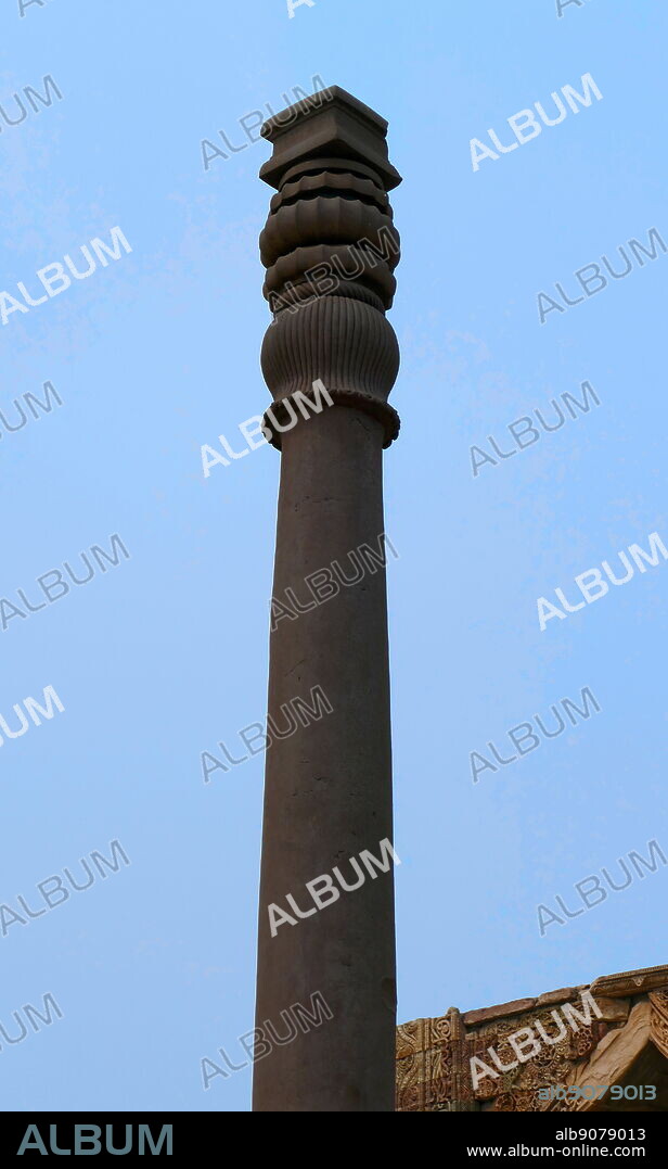 The Iron Pillar located in the Qutb complex (monuments and buildings), at Mehrauli in Delhi, India. It is a 7 m (23 ft) column, in the Qutb complex, notable for the rust-resistant composition of the metals used in its construction. The pillar weighs over 6,000 kg (13,000 lb), and is thought to have originally been erected in what is now Udayagiri by one of the Gupta monarchs in approximately 402 CE.
