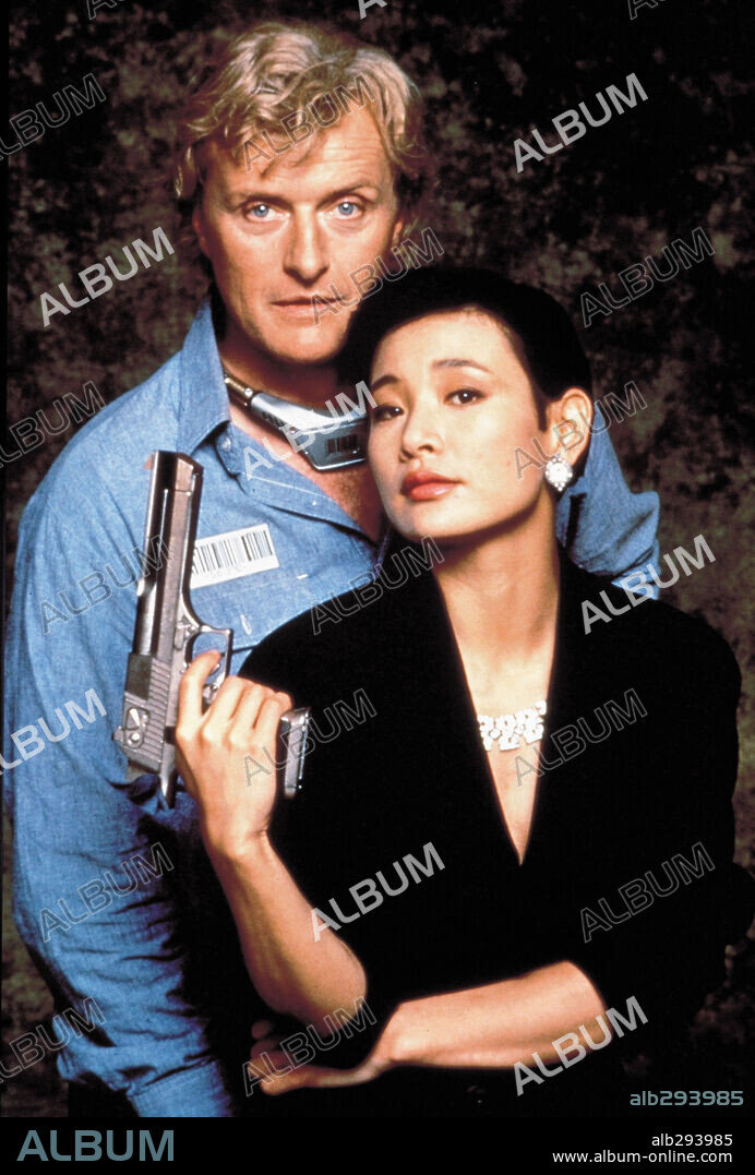 JOAN CHEN y RUTGER HAUER en PELIGROSAMENTE UNIDOS, 1991 (WEDLOCK), dirigida por LEWIS TEAGUE. Copyright HOME BOX OFFICE.