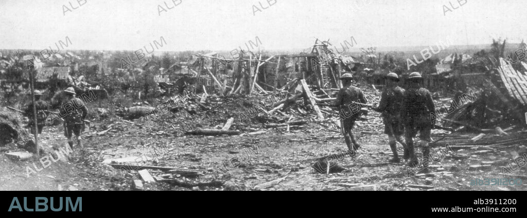 British soldiers exploring the ruins of Albert, Somme, France, 22 August 1918. Albert was the scene of fighting in the Battle of the Somme in 1916 when it was largely reduced to rubble, and the Second Battle of the Somme, fought in August 1918.