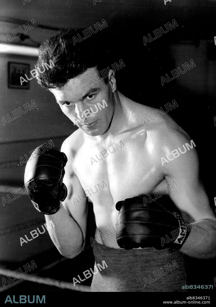He Meets Erskine In May -- Newport-born London milkman Dick Richardson (pictured here) has been matched in a heavyweight boxing contest against Joe Erskine, of Cardiff, over ten rounds, at Cardiff on May 7.Richardson was originally to have fought Henry Coopor, of Bellingham, Harringay, London, next Tuesday (February 7) but the Welshman has withdrawn because of an injured hand.This is a big disappointment for Cooper who say the contest as a chance to force at Harringay in November and is matched with Johnny Williams in a final elimanation for the British championship. February 9, 1955. (Photo by Reuterphoto).