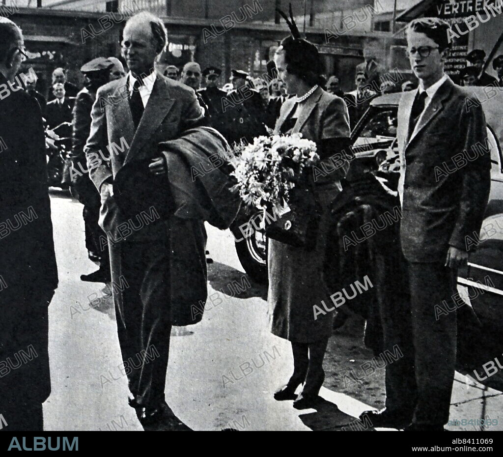 King Leopold of the Belgians, accompanied by Crown Prince Baudouin, with his second wife Princess of Rethy in Amsterdam. Leopold III (3 November 1901 - 25 September 1983) was King of the Belgians from 23 February 1934 until his abdication on 16 July 1951. Princess Lilian of Belgium, Princess of Rethy (born Mary Lilian Henriette Lucie Josephine Ghislaine Baels; 28 November 1916 - 7 June 2002). Baudouin was the elder son of King Leopold III (1901-1983) and his first wife, Princess Astrid of Sweden (1905-1935).