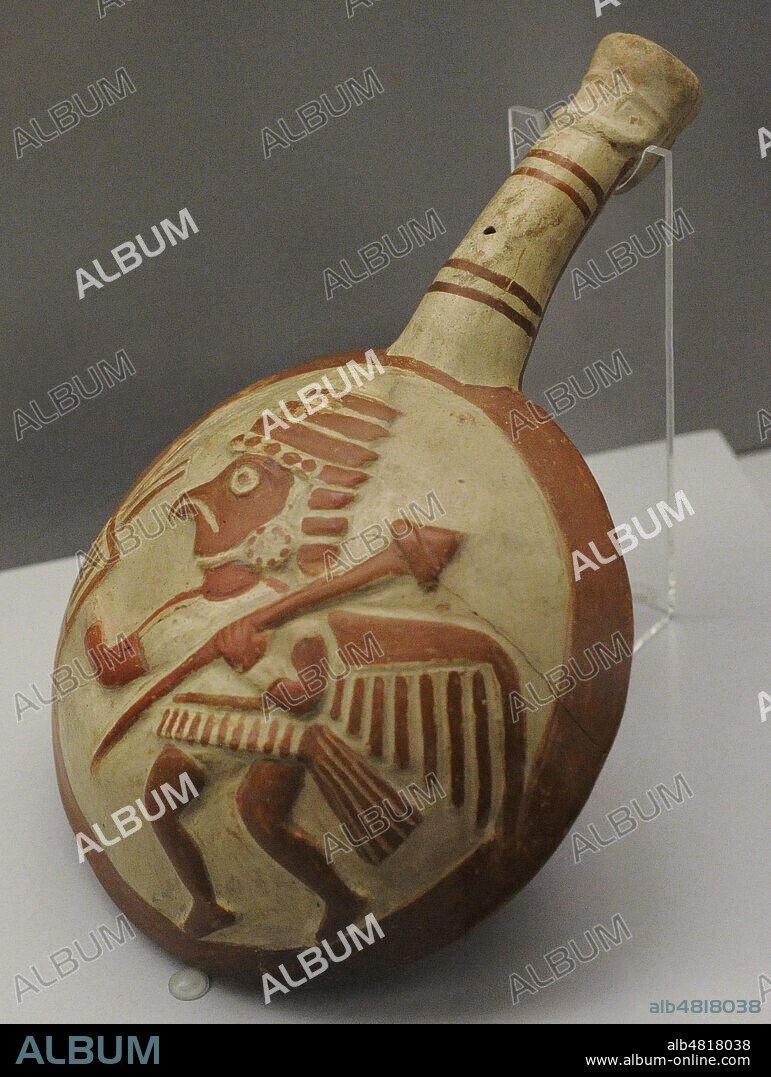 Tostador de maíz o"canchero"con la representación de un guerrero. Cerámica. Cultura Mochica (100 a. C.-700 d. C). Perú. Museo de América. Madrid. España.