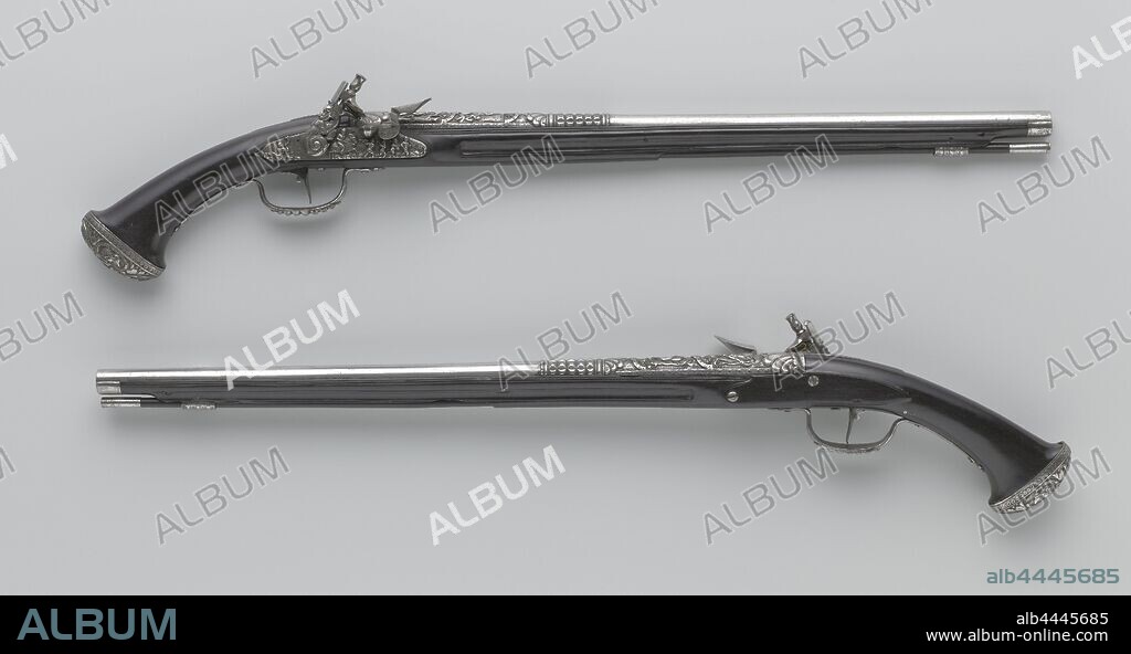 Pair of flintlock pistols, Flintlock pistol, Part of a couple. The cock of the castle is carved in relief in the form of a twisted dragon, the lock plate is decorated with bacchic scenes in high relief, slightly different on 106-A than on 106-B. The barrel is chiseled on the back with two panels with mythological scenes and in front a flat with diamond cut pattern. The flask is made of blackened walnut. The iron fittings include a drawer hood, a trigger guard with a diamond-cut pattern, and a flask carved in relief with four Classic, lauded heads in oval medaljons around the rose below, the ebony loading stick has an iron cap., anonymous, 1645 - 1650, walnut (hardwood), iron (metal), ebony (wood), grinding, l 71.6 cm l 52 cm d 13.7 mm w 1206 gr.