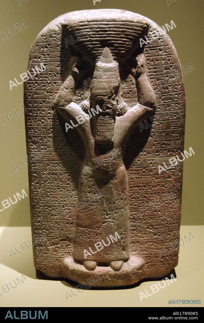 Mesopotamia. Stela of Ashurbanipal. The inscription records that he restored the Esagil temple of Marduk, Babylon. 665-653BC. Cuneiform script. Babylon exposore. Louvre. Paris. France.